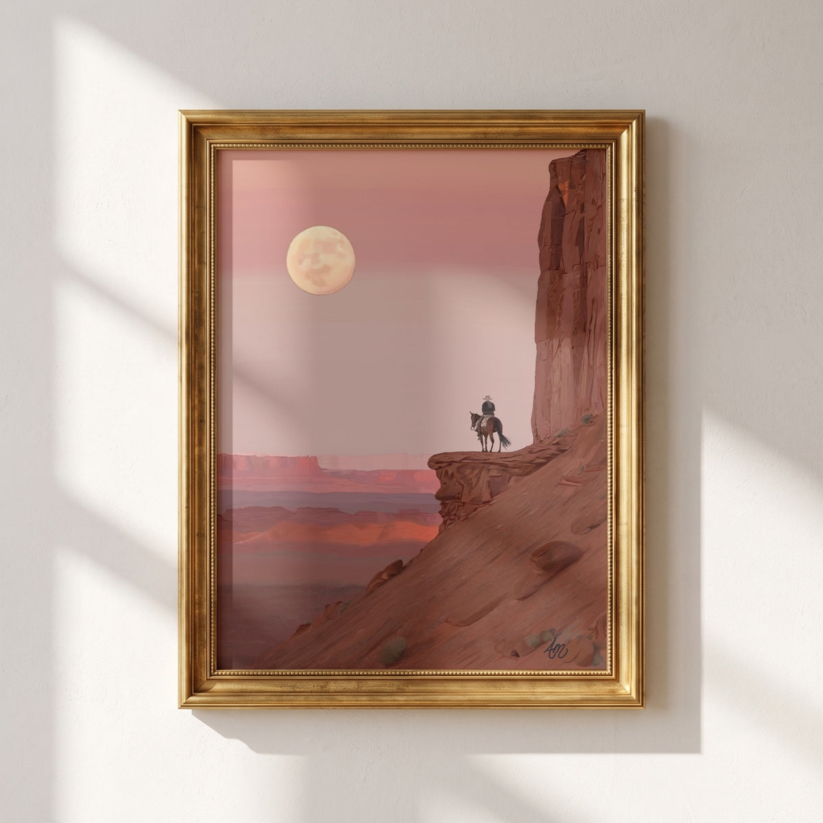 Desert Moon western fine art print framed in gold on a warm neutral wall