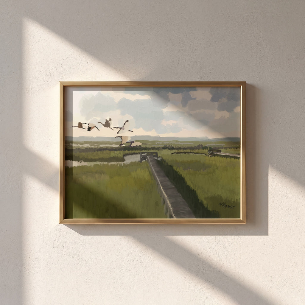 Marsh Crossing fine art print framed in gold on a warm neutral wall